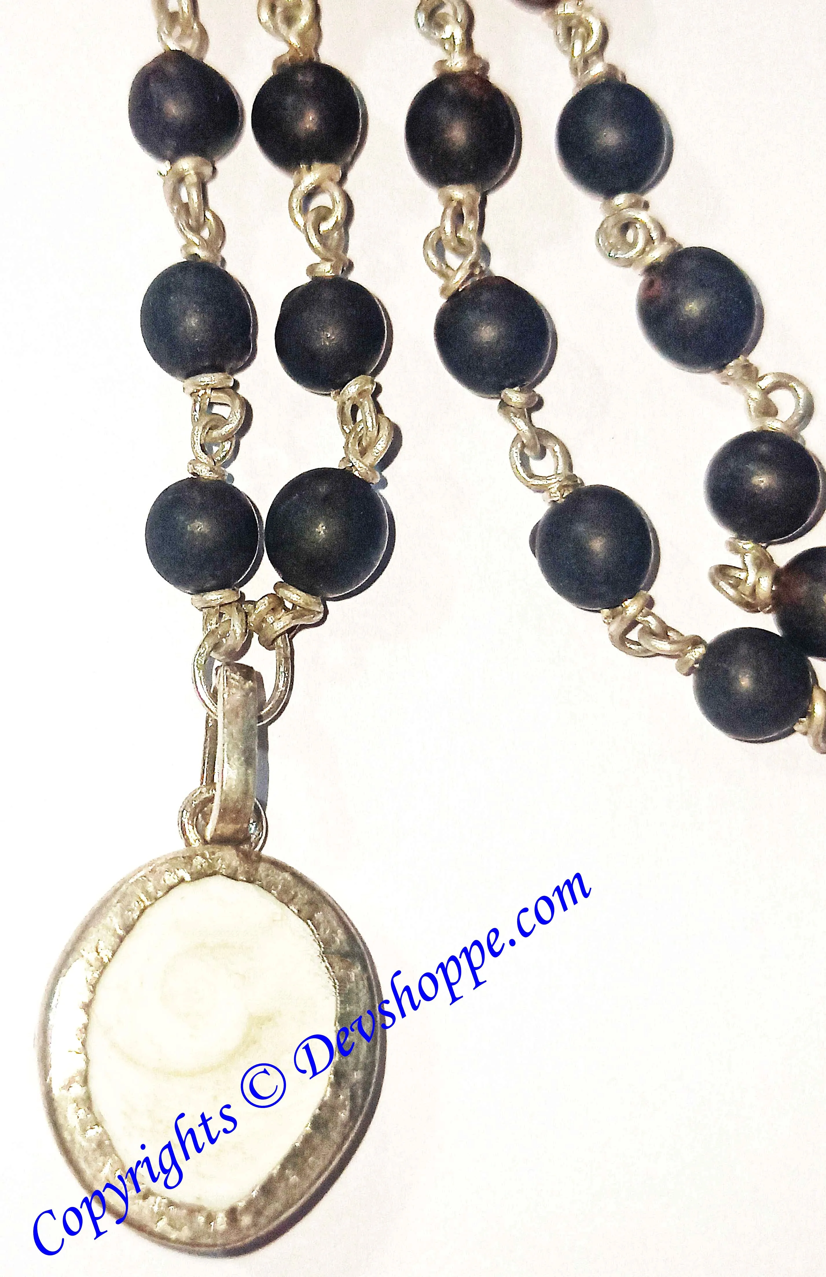 Black Vaijanti mala in silver with Gomti Chakra pendant