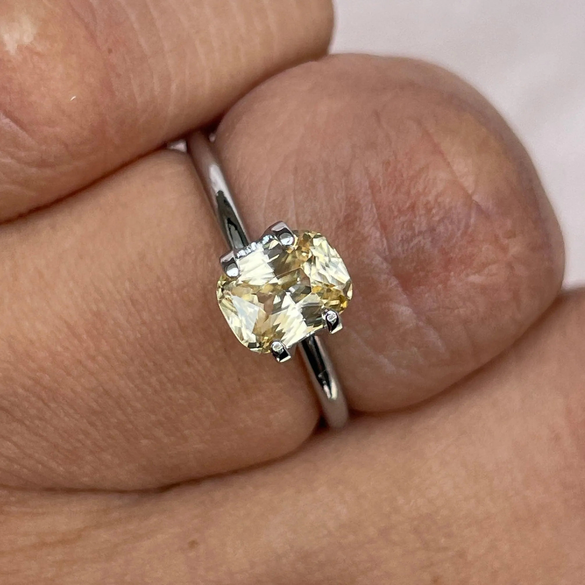 Natural Yellow Sapphire 1.60 ct. yellowish peach fuzz