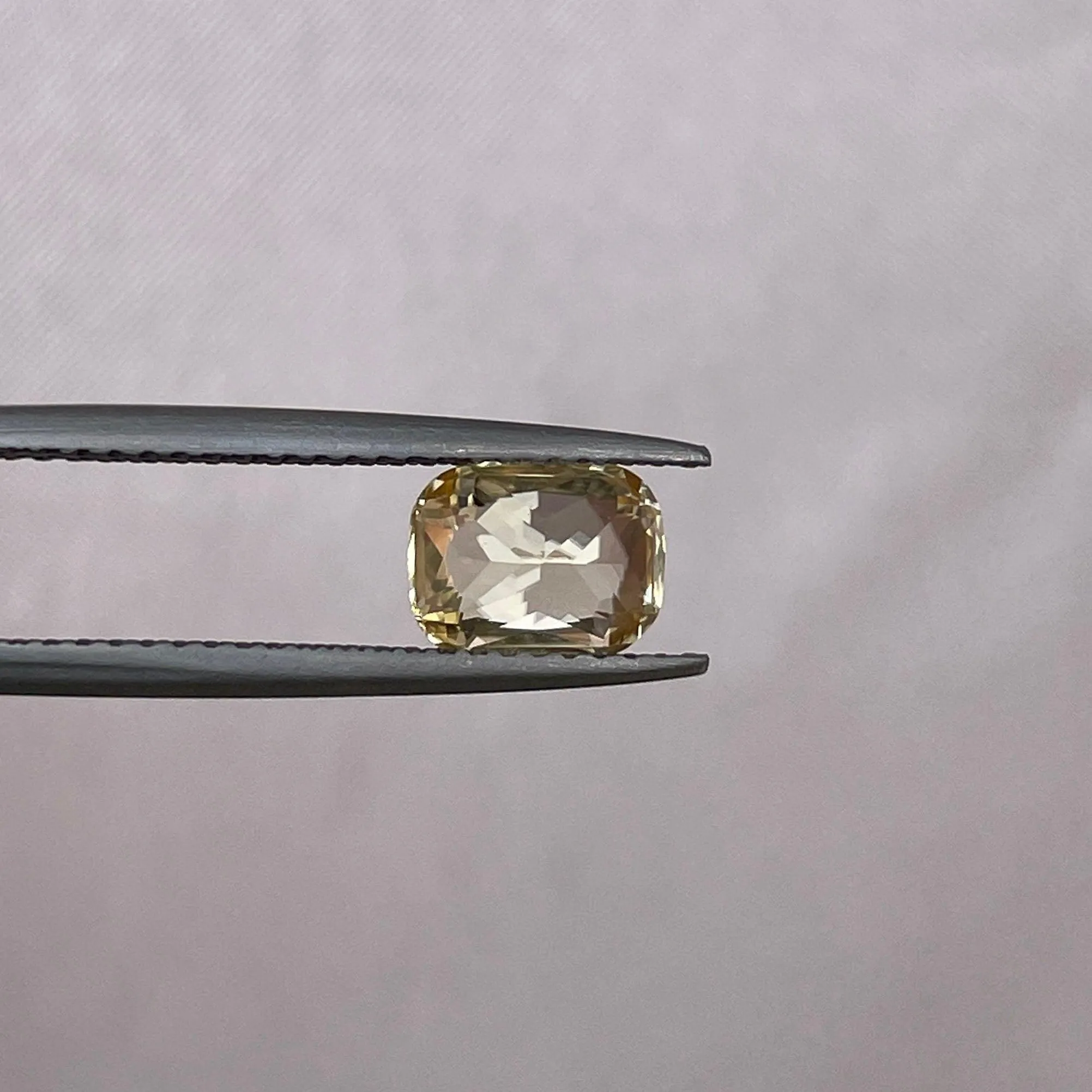 Natural Yellow Sapphire 1.60 ct. yellowish peach fuzz