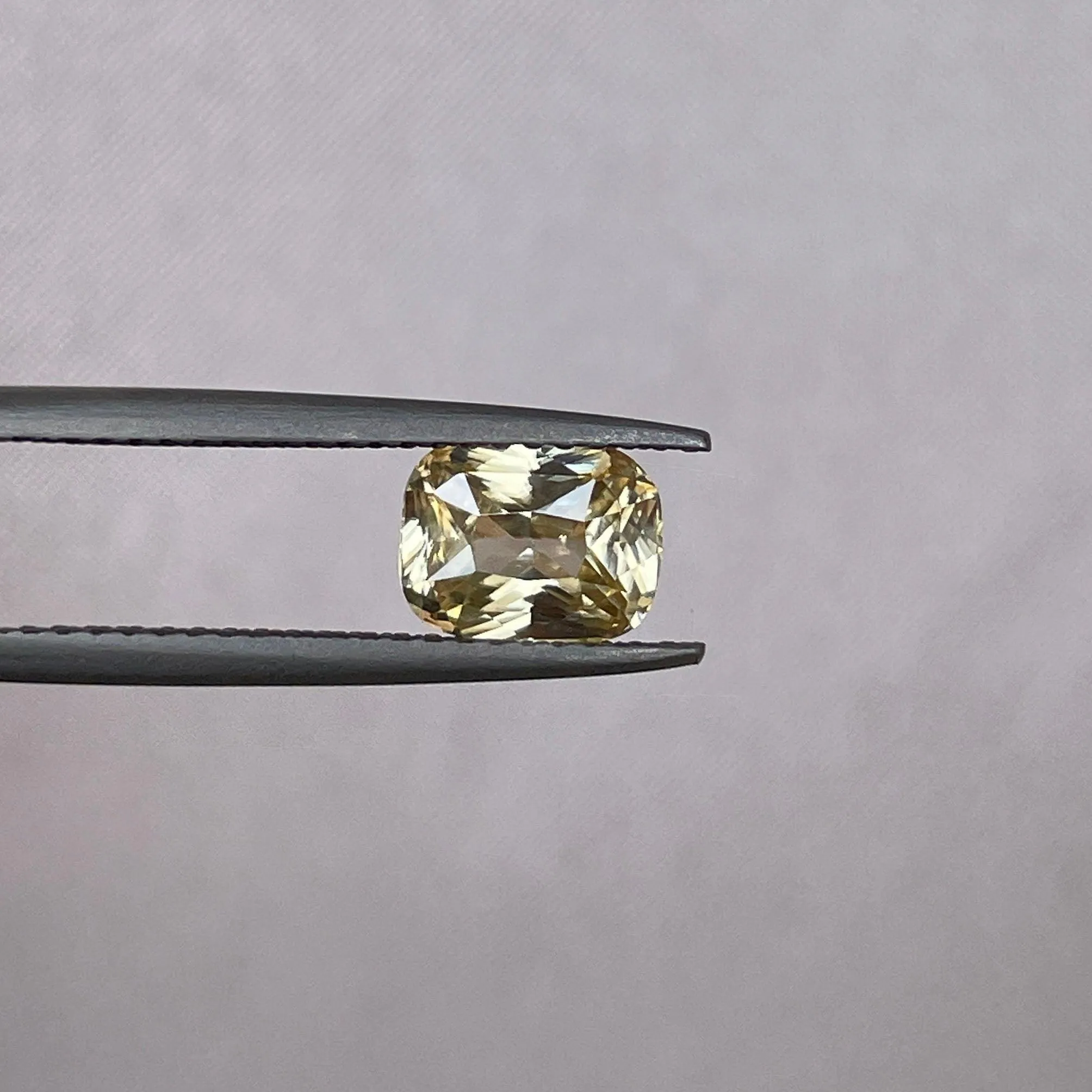 Natural Yellow Sapphire 1.60 ct. yellowish peach fuzz